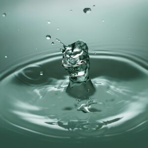 Captivating image capturing the elegance of a water droplet splash with macro precision and clarity.